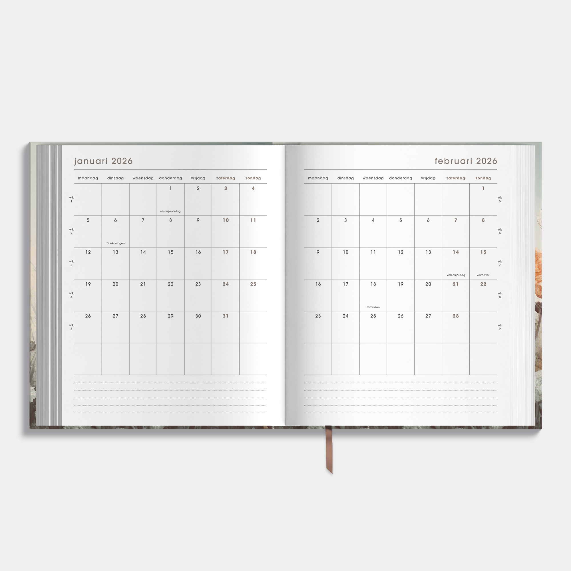 Afsprakenagenda 2026 A5+ formaat met veldbloemenprint – binnenwerk met maandplanner.