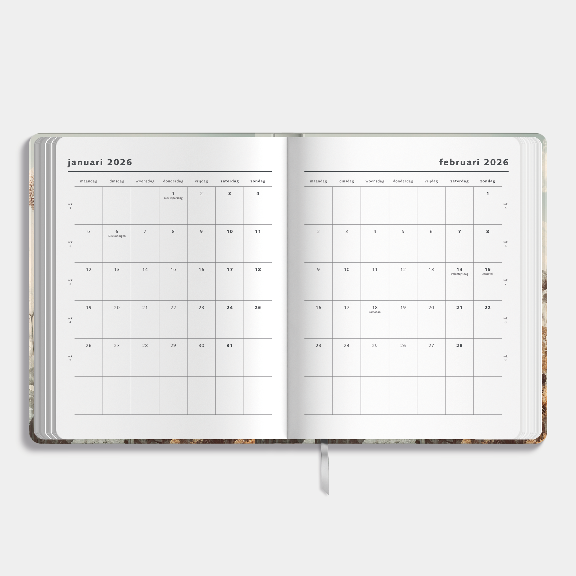 weekplanner 2026 met stijlvolle veldbloemenprint – binnenwerk met maandplanner.