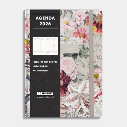 A5 agenda 2026 met een print van kleurrijke bloemen, harde cover en elastische sluiting – vooraanzicht met informatieve banderol.