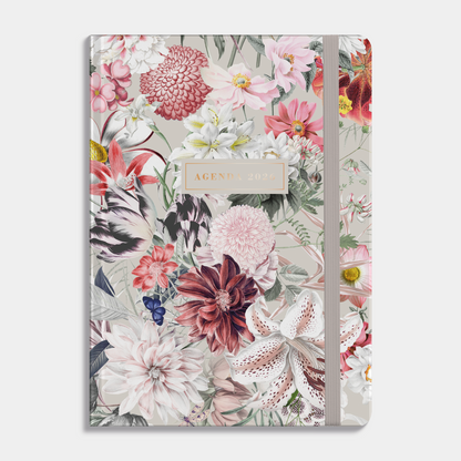 A5 agenda 2026 met een print van kleurrijke bloemen, harde cover en elastische sluiting – vooraanzicht.