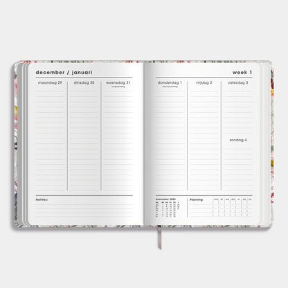 A5 agenda 2026 met een print van kleurrijke bloemen – crèmekleurig binnenwerk met weekoverzicht.