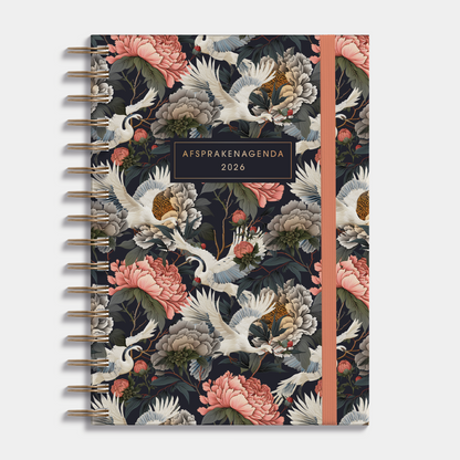 Afsprakenagenda 2026 A5 met klassieke print van kraanvogels en pioenrozen, harde cover, spiraalbinding en elastische sluiting – vooraanzicht.
