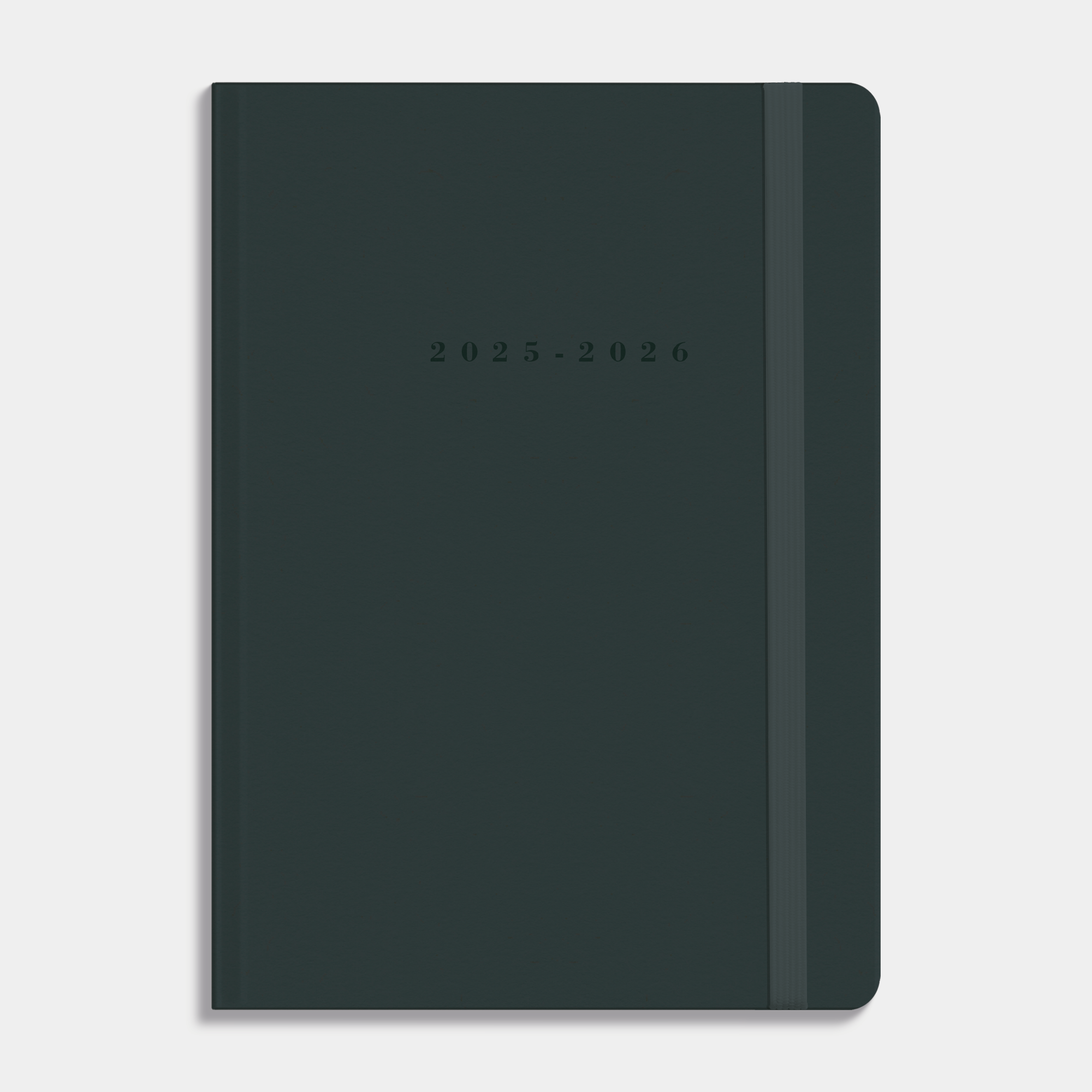 Luxe schoolagenda 2025 - 2026 A5 met grijze suèdelook afwerking, harde cover en elastische sluiting – vooraanzicht.