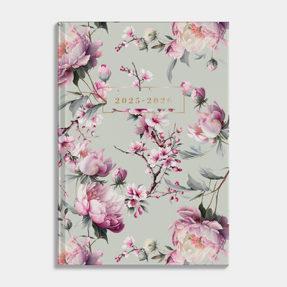 Mini agenda 2025-2026 met kersenbloesemprint en harde cover – vooraanzicht.