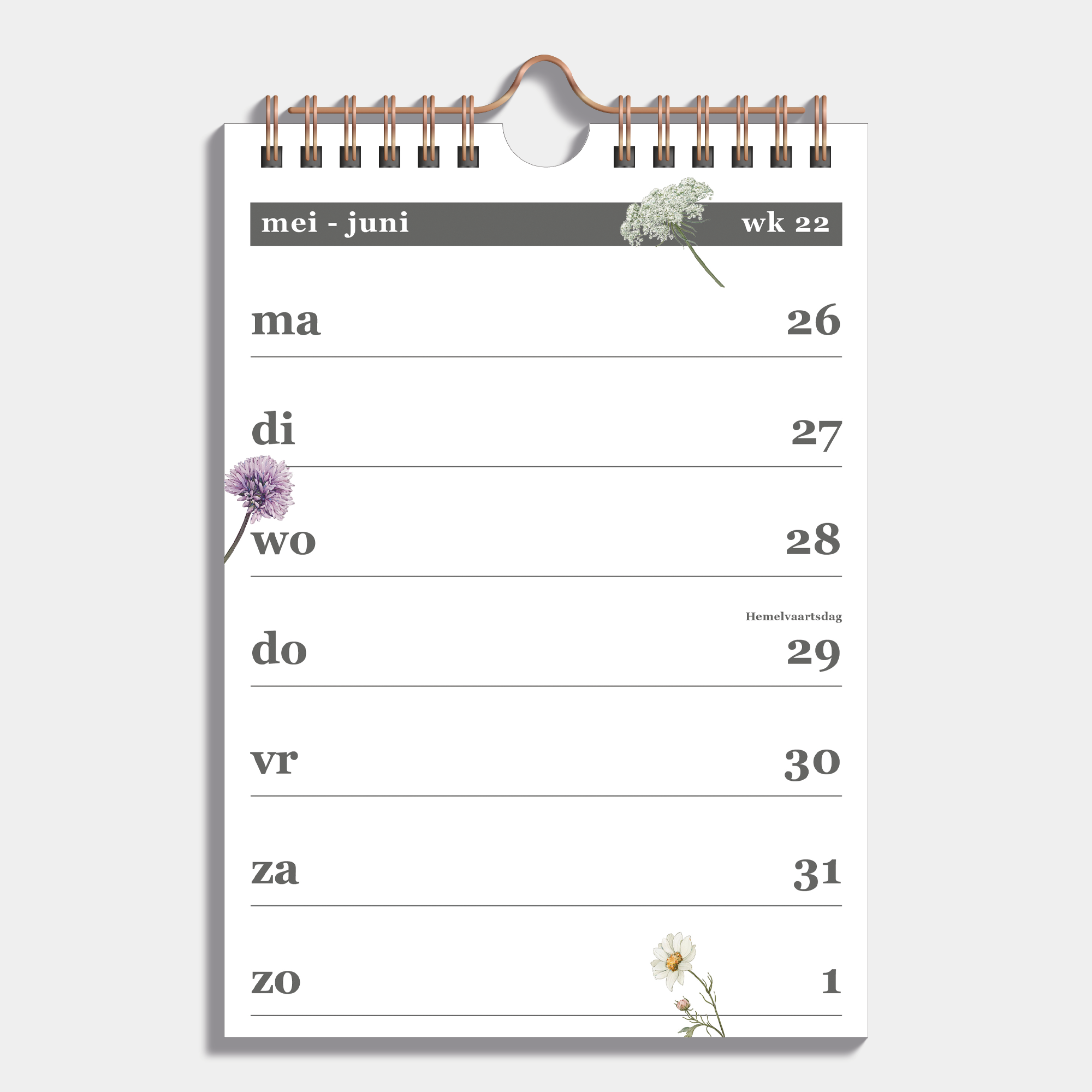 Weekkalender schooljaar 2025 - 2026 A5 met weidebloemenprint en metalen spiraal – binnenwerk met weekoverzicht.