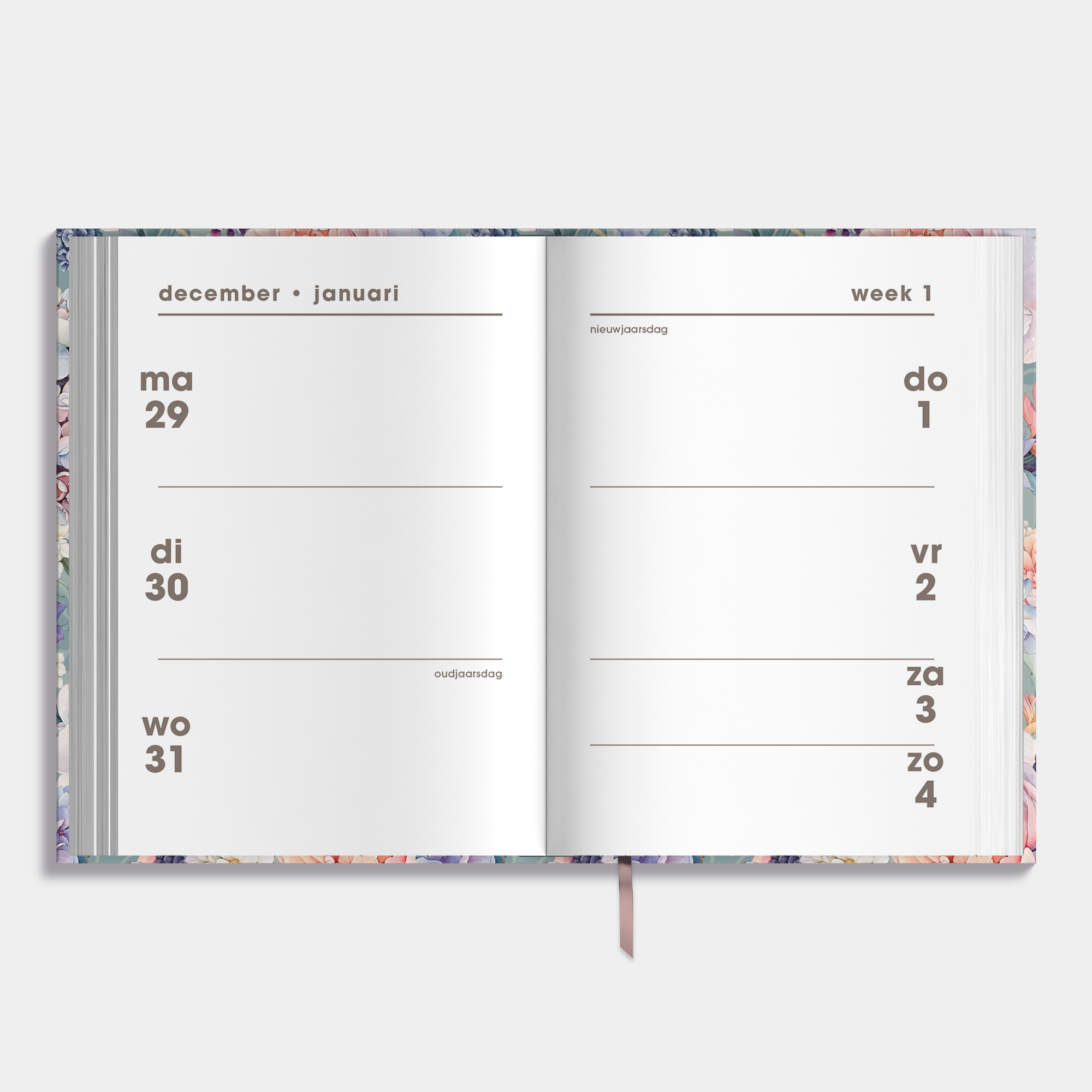 kleine agenda 2026 met print van hortensia's en harde cover – binnenwerk met weekoverzicht.