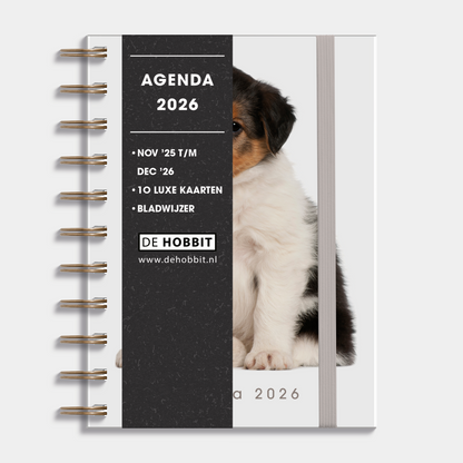 A6 ringband agenda 20206 met foto van een puppy, harde cover en elastische sluiting – vooraanzicht met informatieve banderol.