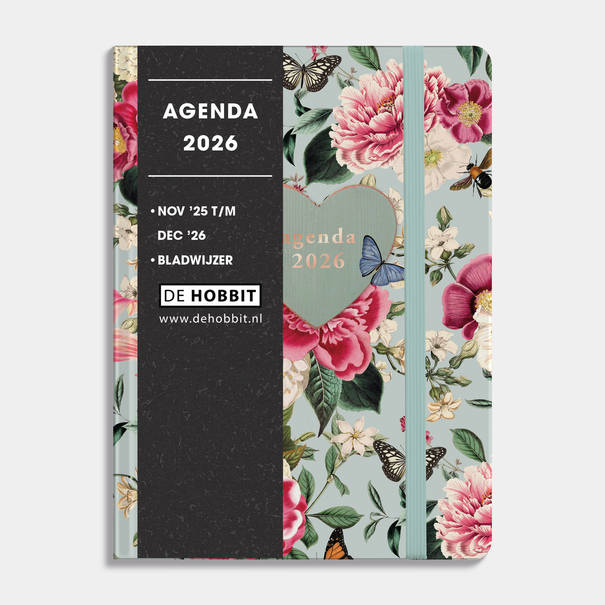 A6 agenda 2026 met brocante print, zachte maar stevige cover en elastische sluiting – vooraanzicht met informatieve banderol.