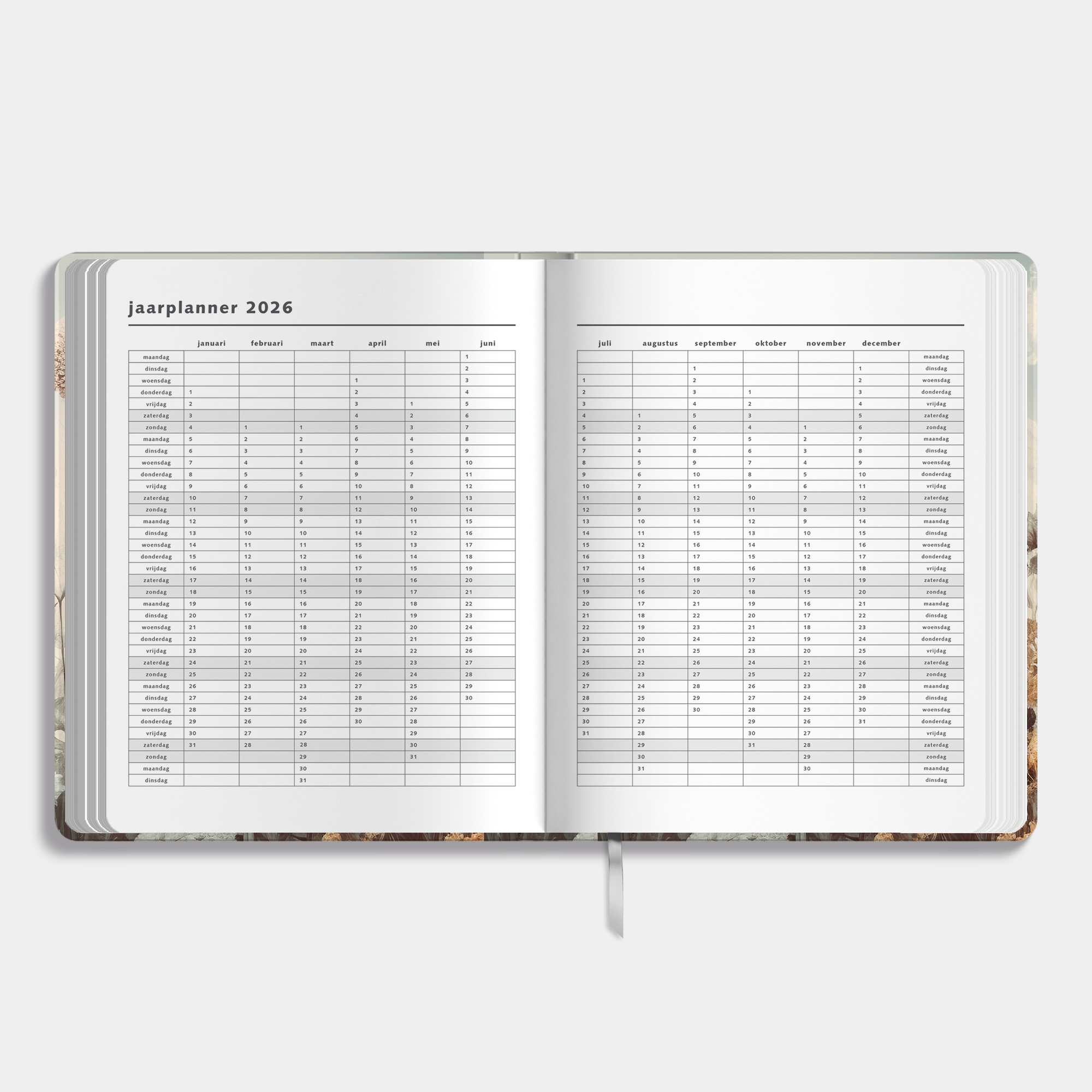 weekplanner 2026 met stijlvolle veldbloemenprint – binnenwerk met jaarplanner.
